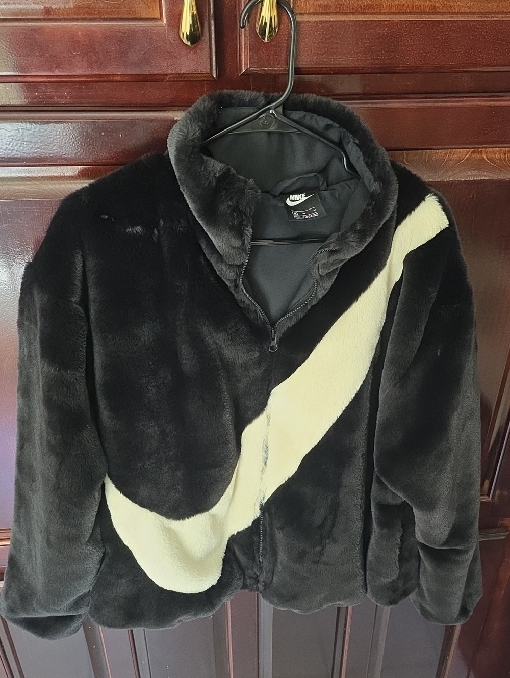 Nike Black Faux Fur Jacket with Cream Swoosh Accent